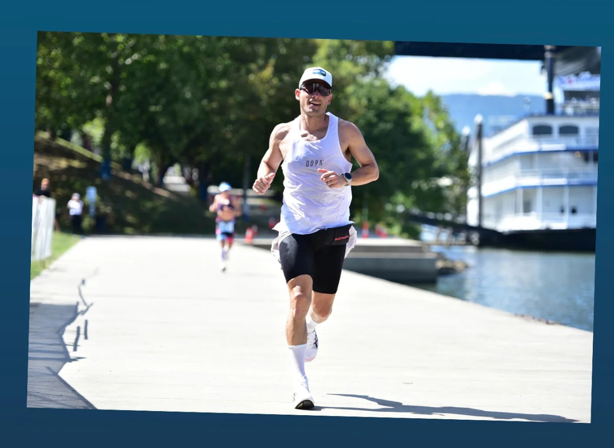 Jason running alongside the waterfront
